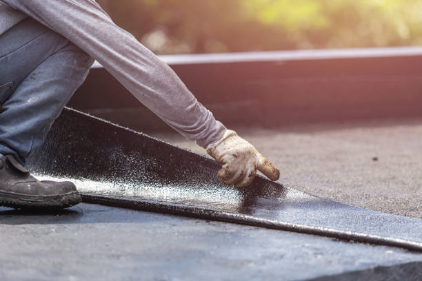 Professional Waterproofing technician working in Utica, NY